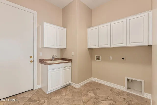 a front view of a house with a yard and seating area