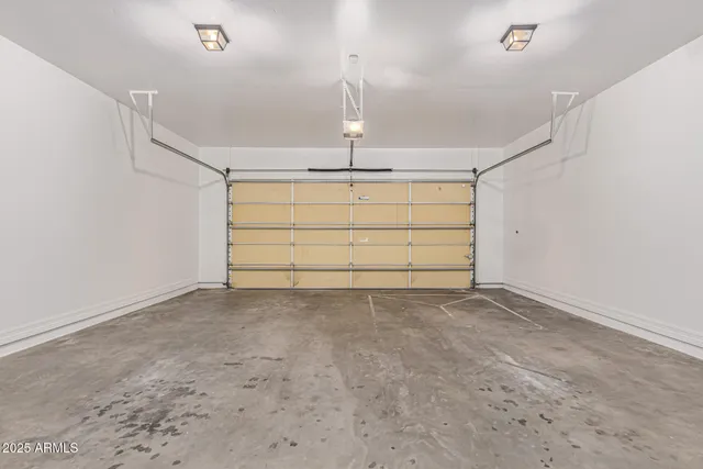 a view of a swimming pool with a yard