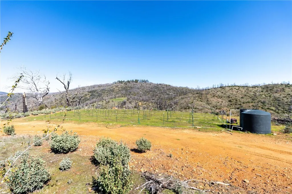 0 Big Ridge Road Berry Creek, CA 95916 - Photo 18 of 25 a view of a lake with a mountain