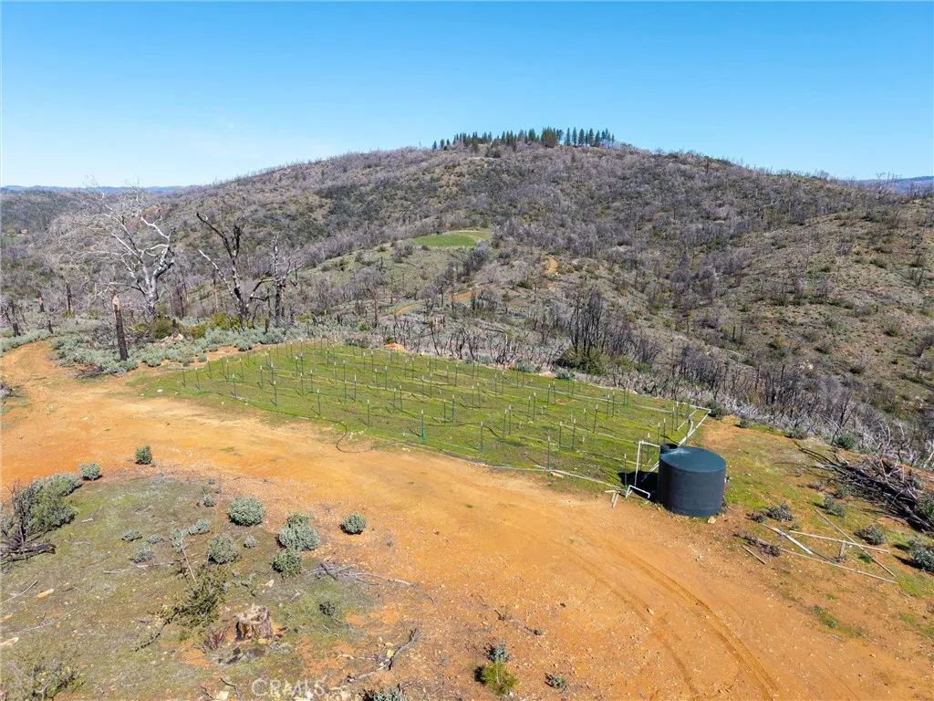 0 Big Ridge Road Berry Creek, CA 95916 - Photo 10 of 25 a view of a lake with a mountain in the background