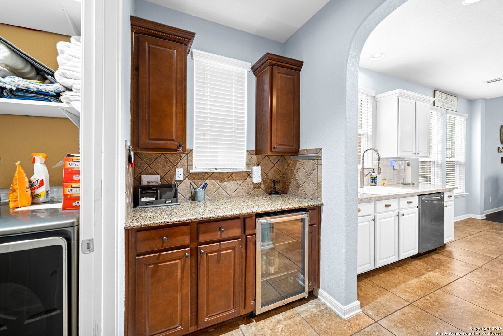 13119 Moselle Forest Helotes, TX 78023 - Photo 12 of 38 a kitchen with granite countertop a sink stainless steel appliances and cabinets