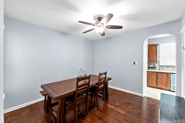 a bed room with a bed and a chair