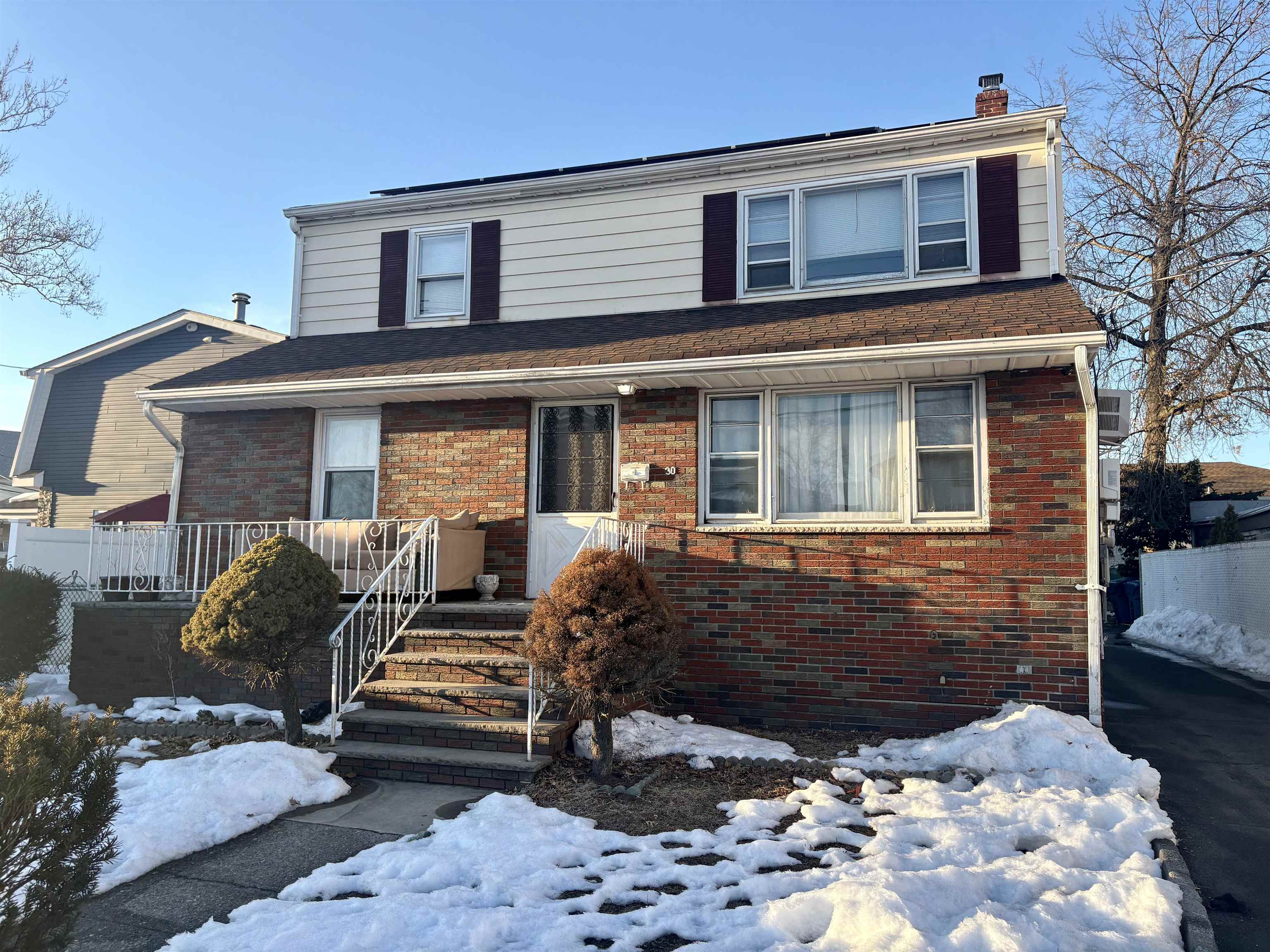 30 Kennedy Street, Unit 2 Hackensack, NJ 07601 - Photo 2 of 11 a front view of a house with a large window