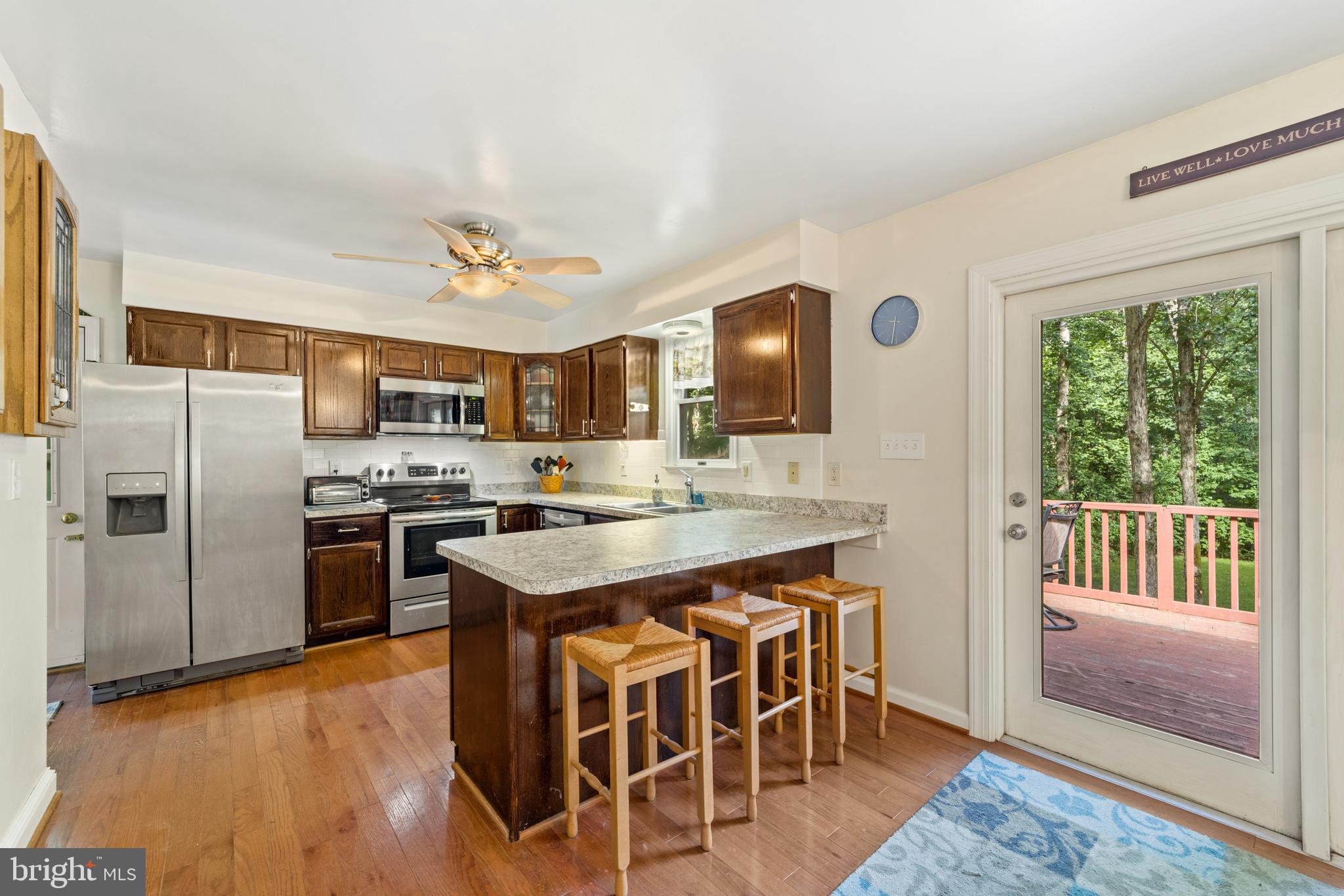 4544 Hurst Road Bealeton, VA 22712 - Photo 7 of 36 Large Eat-In Kitchen leads to large deck