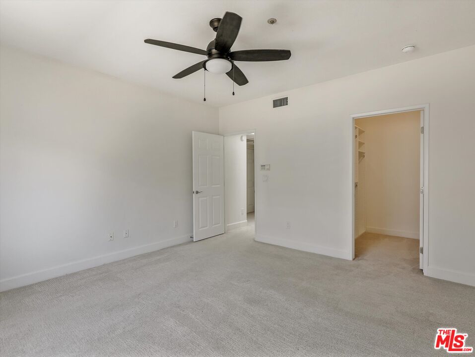 937 12th Street, Unit 308 Santa Monica, CA 90403 - Photo 22 of 39 a view of a room with a ceiling fan