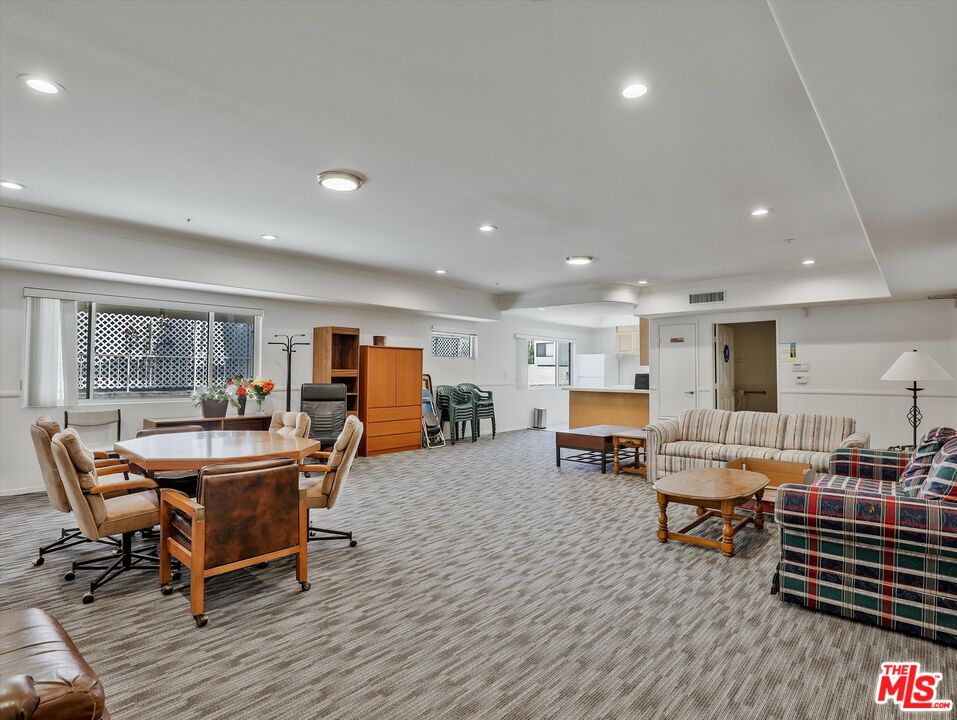 937 12th Street, Unit 308 Santa Monica, CA 90403 - Photo 33 of 39 a living room with furniture and wooden floor