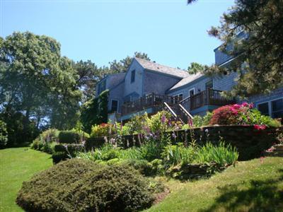 55 Strong Island Road Chatham, MA 02633 - Photo 3 of 16 a front view of a house with a yard