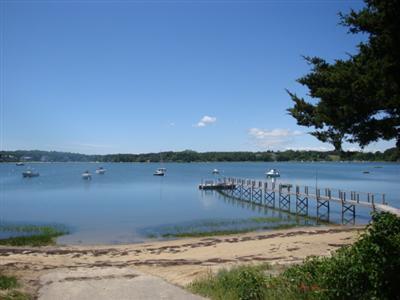 55 Strong Island Road Chatham, MA 02633 - Photo 4 of 16 a view of a lake view next to a building