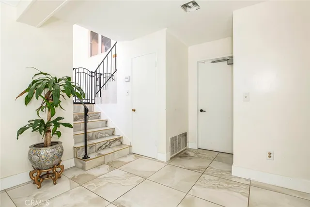 a view of backyard with garden and trees