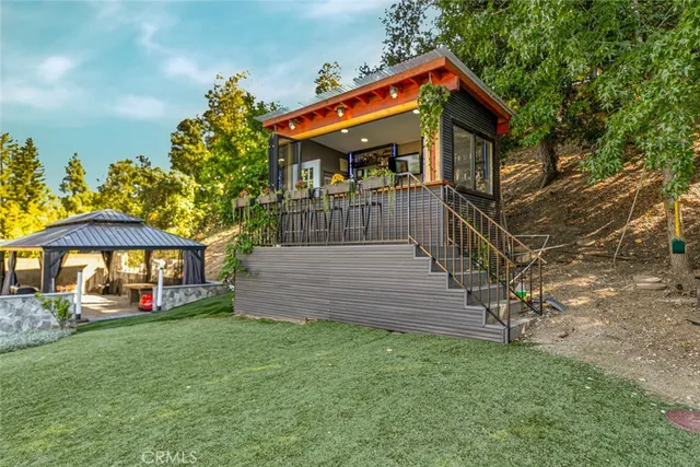 a view of a chairs and tables in patio