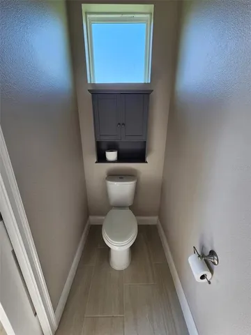 a bathroom with a toilet