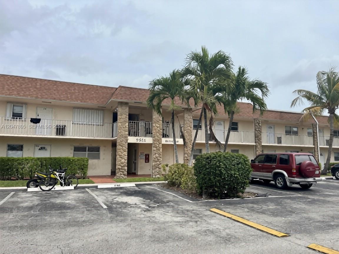 9851 Sandalfoot Boulevard, Unit 213 Boca Raton, FL 33428 - Photo 1 of 10