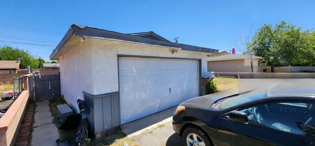 a view of car parked in front of house