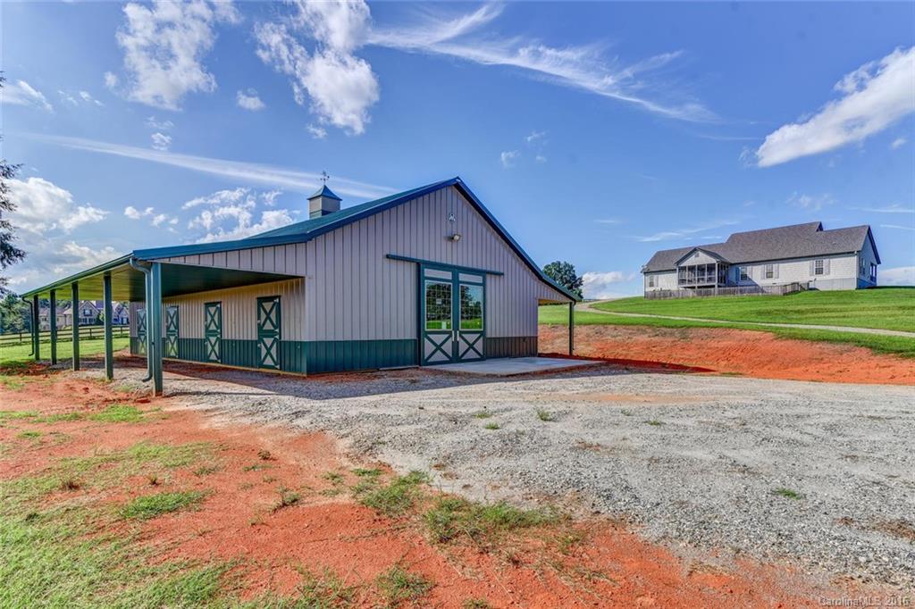 944-a R A R Thompson Road, Unit 25 Mill Spring, NC 28756 - Photo 22 of 24 a house view with a backyard space