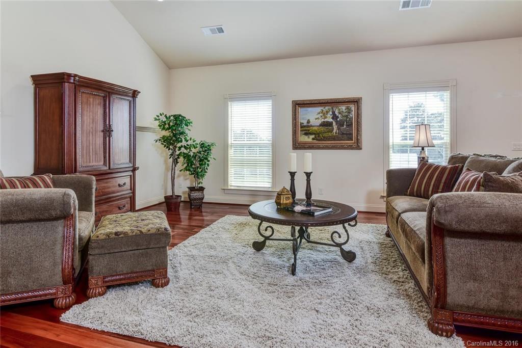 944-a R A R Thompson Road, Unit 25 Mill Spring, NC 28756 - Photo 8 of 24 a living room with furniture and a rug