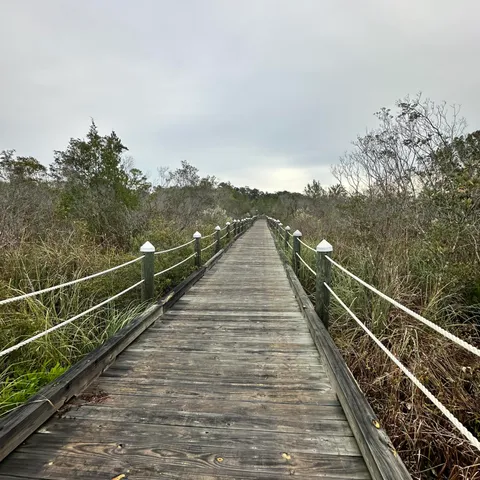 a view of balcony with furniture