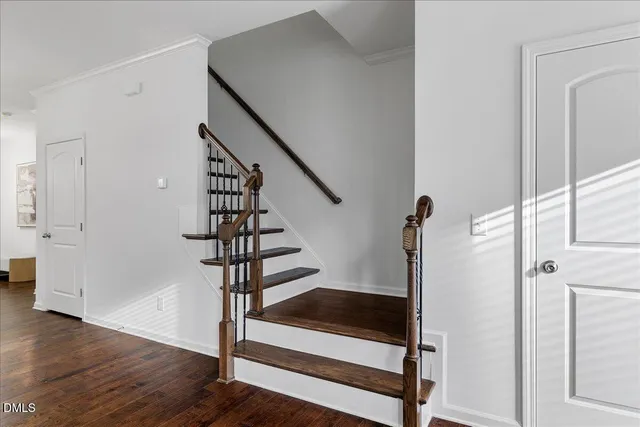 a view of entryway with wooden floor