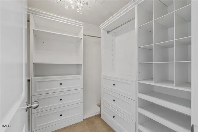 a view of an empty walk in closet