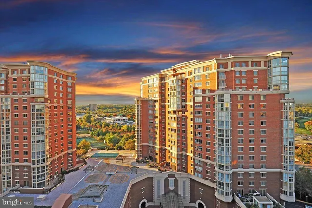 a view of a city with tall buildings
