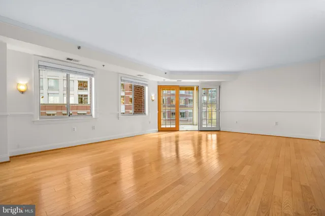 a view of an empty room and window