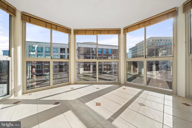 a view of a kitchen with a window and a sink