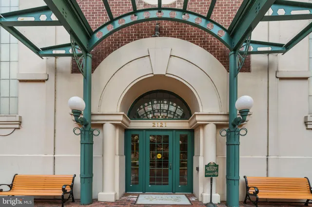 a large spacious bathroom with a granite countertop sink a mirror a bathtub and shower
