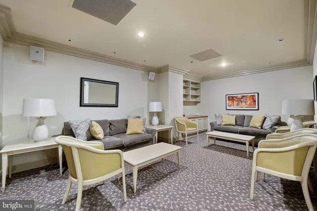 a view of swimming pool with chairs