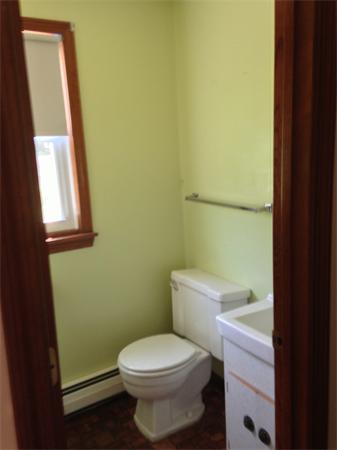 25 Plumtree Road Sunderland, MA 01375 - Photo 20 of 29 a white toilet sitting next to a small sink