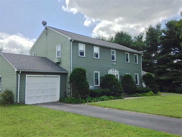 25 Plumtree Road Sunderland, MA 01375 - Photo 2 of 29 a front view of a house with a garden and trees