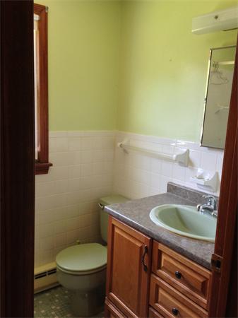 25 Plumtree Road Sunderland, MA 01375 - Photo 24 of 29 a bathroom with a granite countertop toilet and a sink