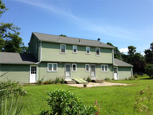 25 Plumtree Road Sunderland, MA 01375 - Photo 27 of 29 a front view of a house with a garden and porch