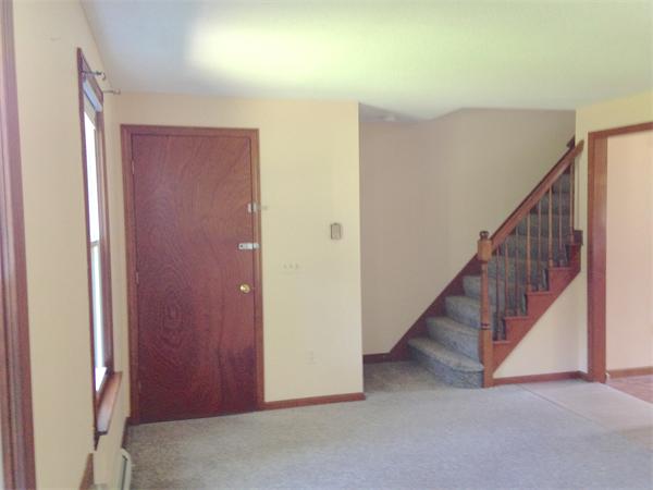 25 Plumtree Road Sunderland, MA 01375 - Photo 3 of 29 a view of a hallway with staircase