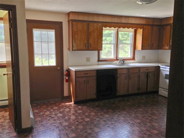 25 Plumtree Road Sunderland, MA 01375 - Photo 8 of 29 a kitchen with a sink window and cabinets