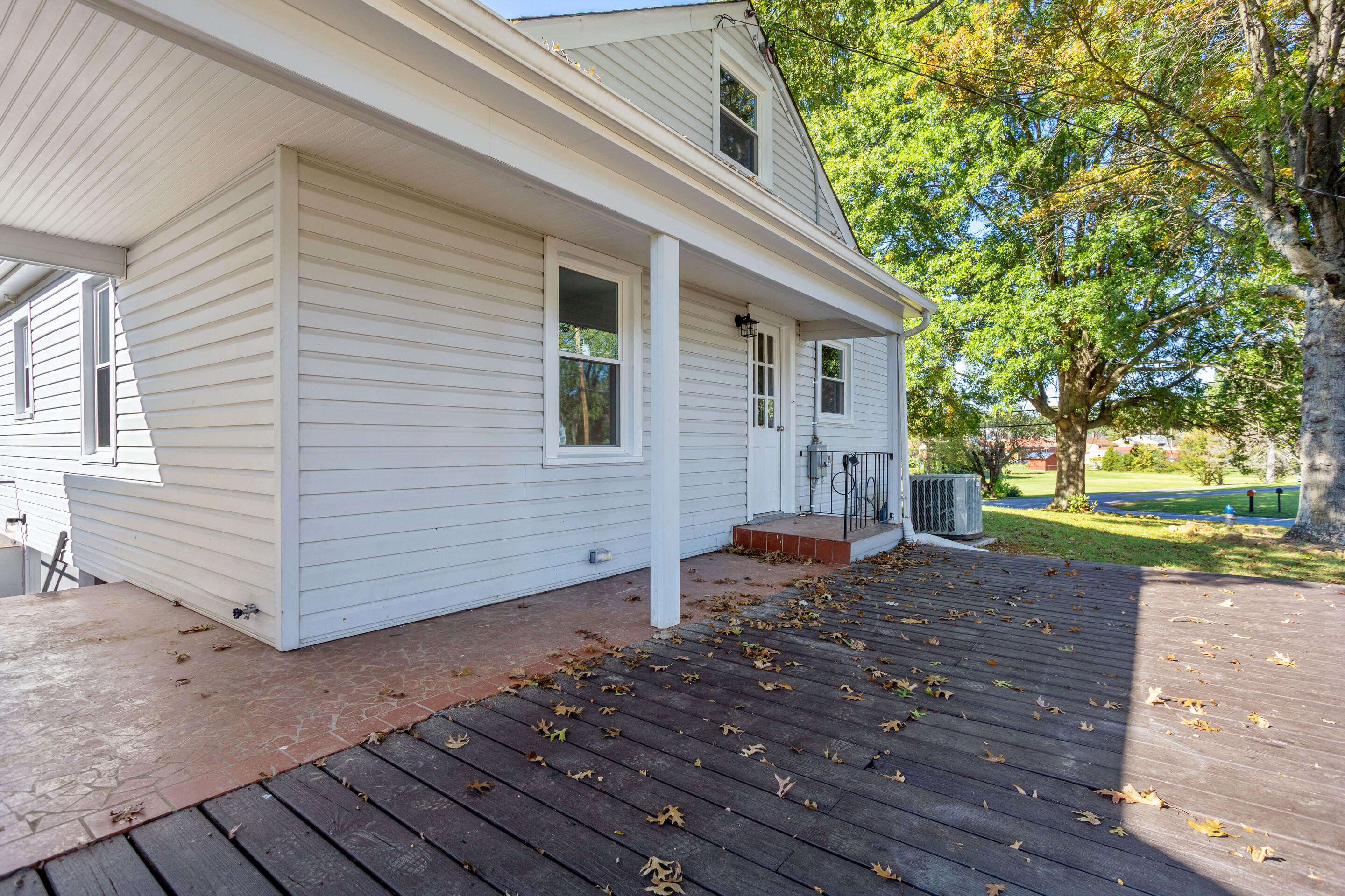 3802 Cove Road Roanoke, VA 24017 - Photo 22 of 30 a front view of a house with a yard