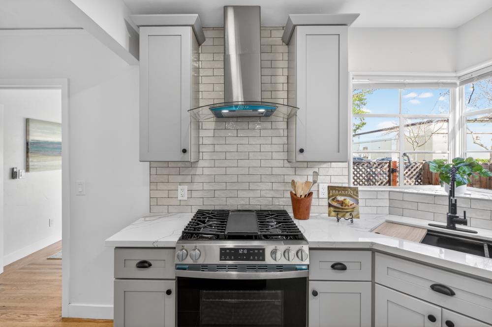 2008 Argail Way Sacramento, CA 95822 - Photo 18 of 53 a white stove top oven sitting inside of a kitchen