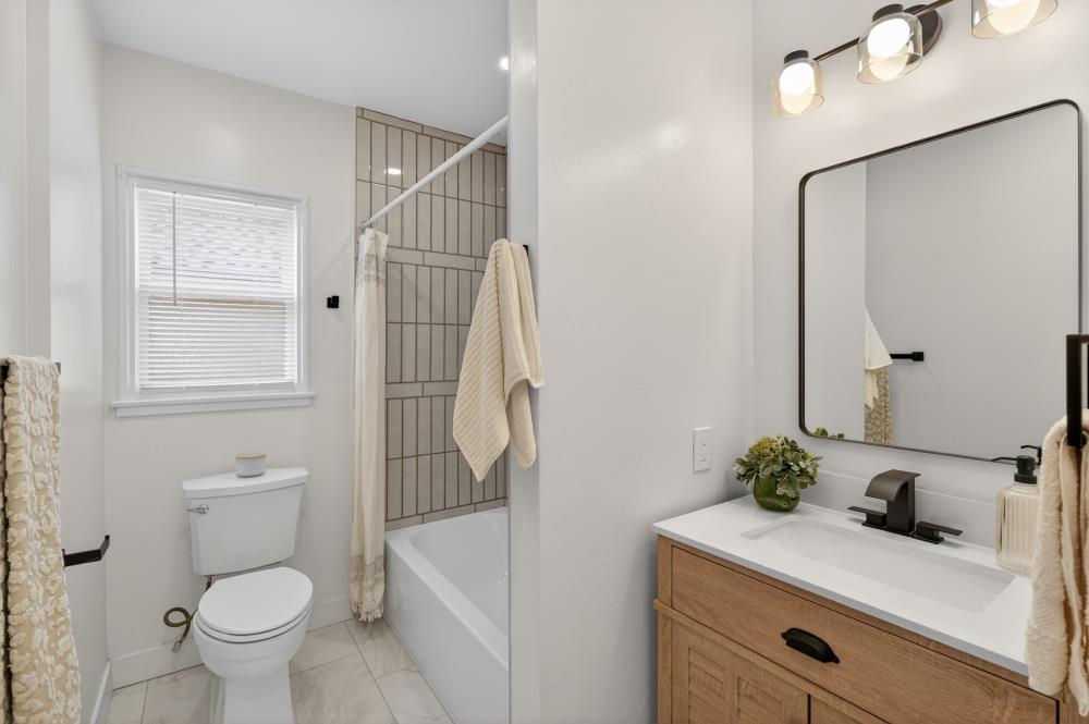 2008 Argail Way Sacramento, CA 95822 - Photo 23 of 53 a bathroom with a sink toilet and shower