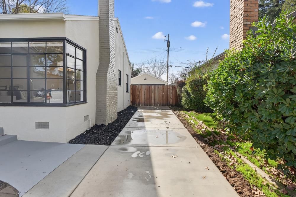 2008 Argail Way Sacramento, CA 95822 - Photo 4 of 53 a view of a patio with table and chairs with wooden fence and plants