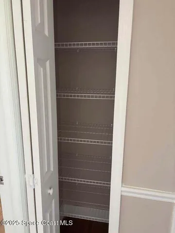 a bathroom with a glass door shower