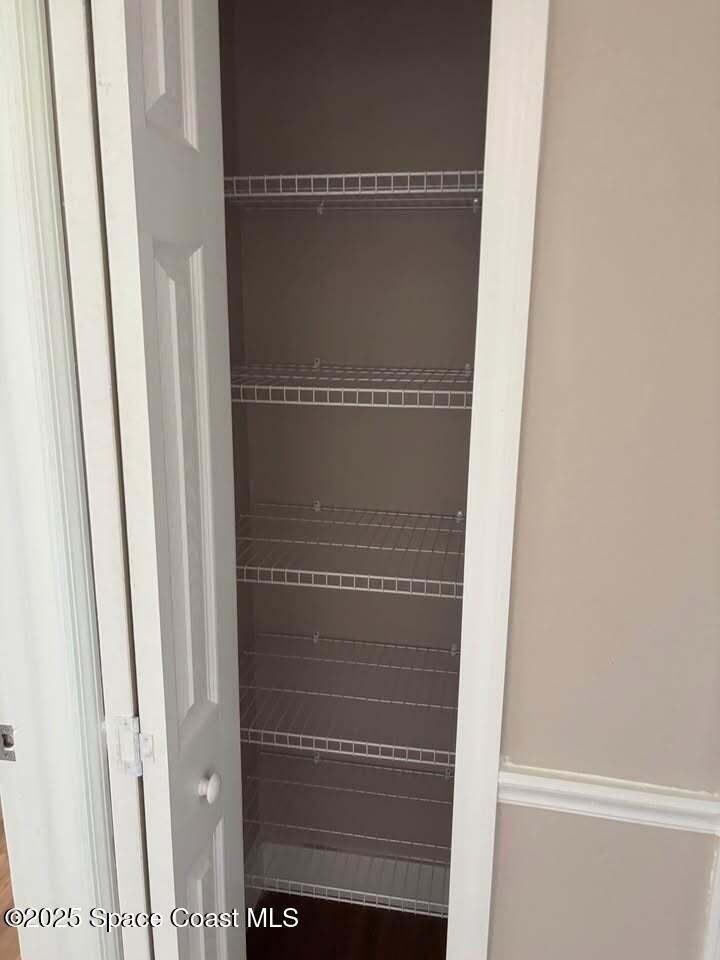 1720 Murrell Road, Unit 214 Rockledge, FL 32955 - Photo 8 of 8 a bathroom with a glass door shower