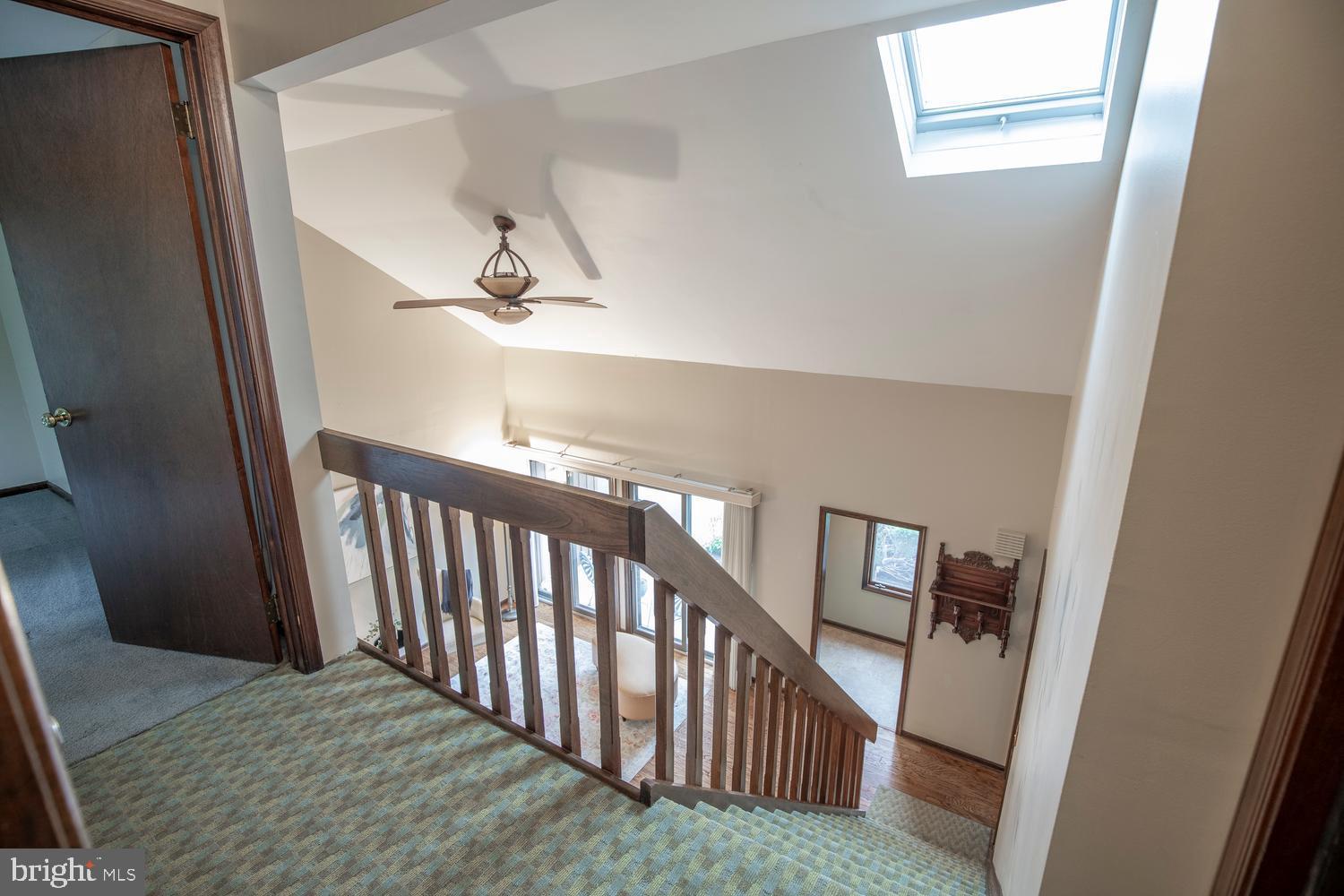 225 Pueblo Road Doylestown, PA 18901 - Photo 28 of 35 a view of a hallway with wooden floor and staircase