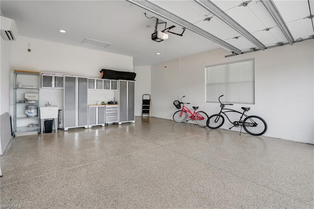 12068 Azalea Way Naples, FL 34120 - Photo 41 of 50 a view of a room with gym equipment