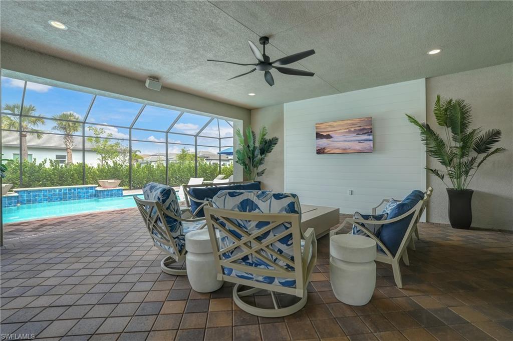 12068 Azalea Way Naples, FL 34120 - Photo 45 of 50 a view of a dining room with furniture window and outside view