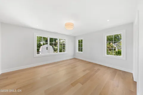 an empty room with windows