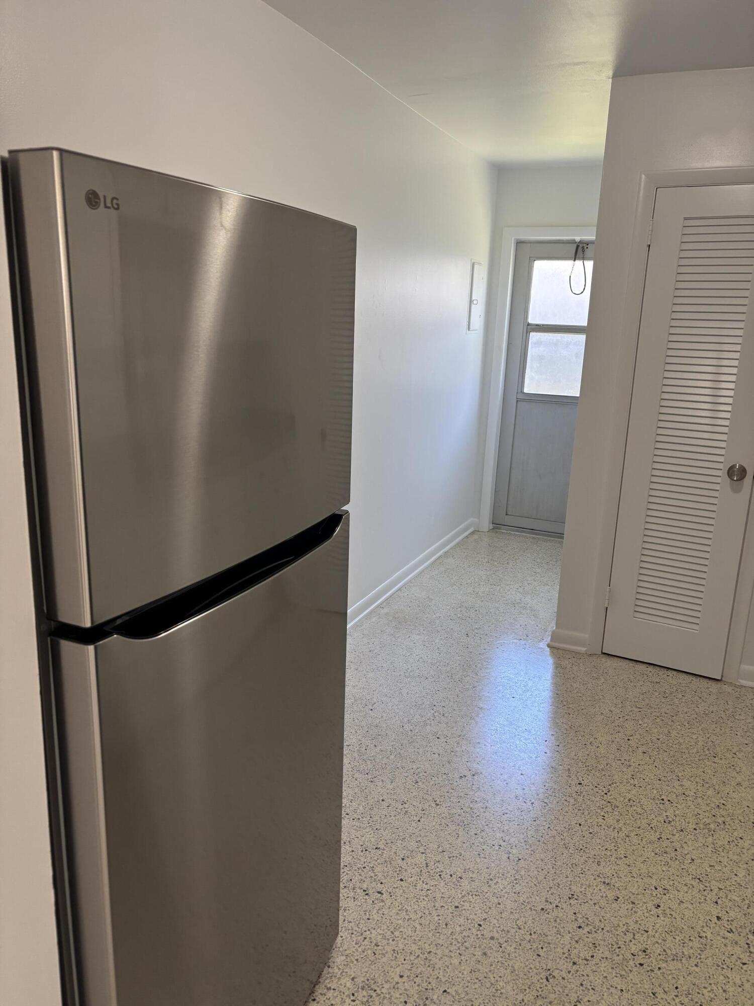 751 Hummingbird Way, Unit 5 North Palm Beach, FL 33408 - Photo 6 of 18 a view of closet
