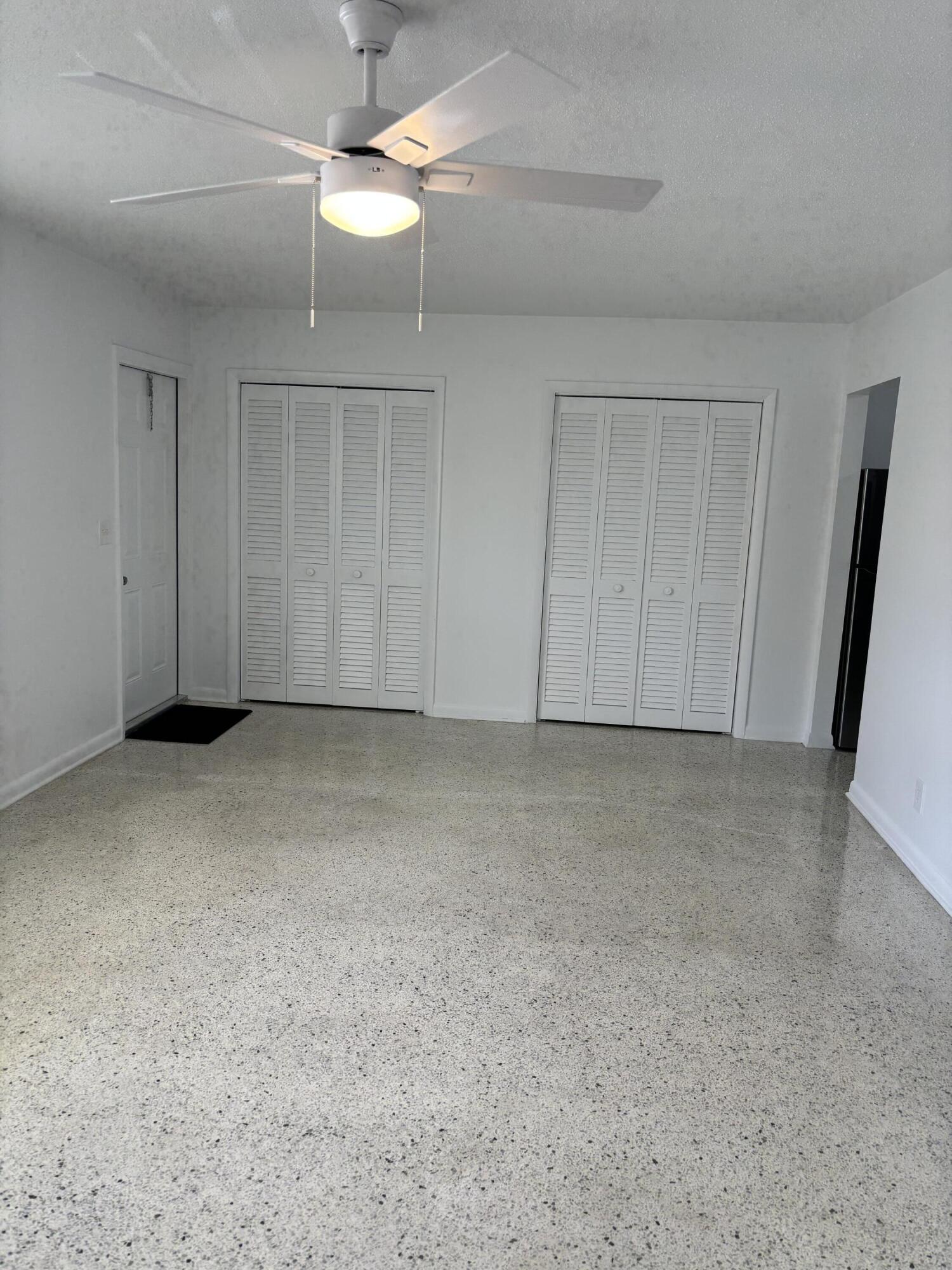 751 Hummingbird Way, Unit 5 North Palm Beach, FL 33408 - Photo 9 of 18 a view of empty room