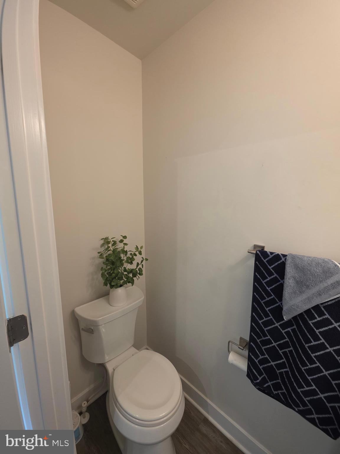 14510 Hunts Farm Road Brandywine, MD 20613 - Photo 29 of 74 a bathroom with a toilet and a shower curtain