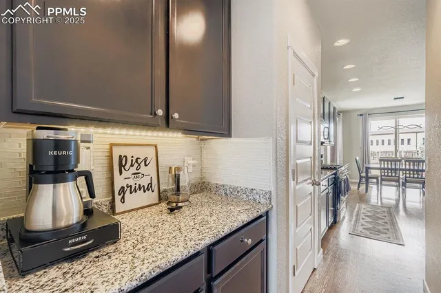 a view of a kitchen with a sink