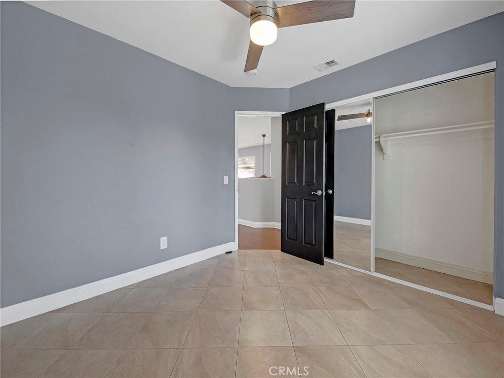 27626 Iris Place Castaic, CA 91384 - Photo 27 of 28 Upstairs bedroom with good sized closet.