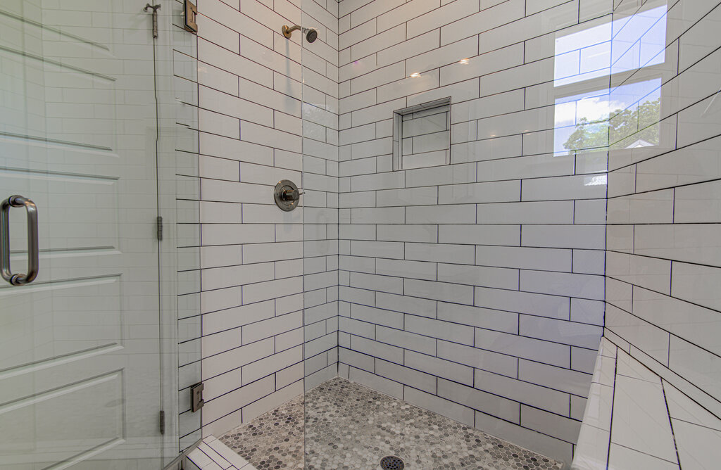 2406 East 16th Street Austin, TX 78702 - Photo 13 of 39 a bathroom with a shower