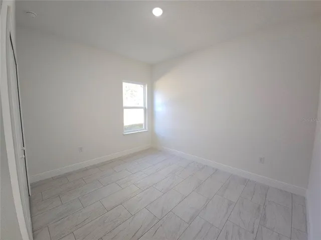 a view of empty room with window